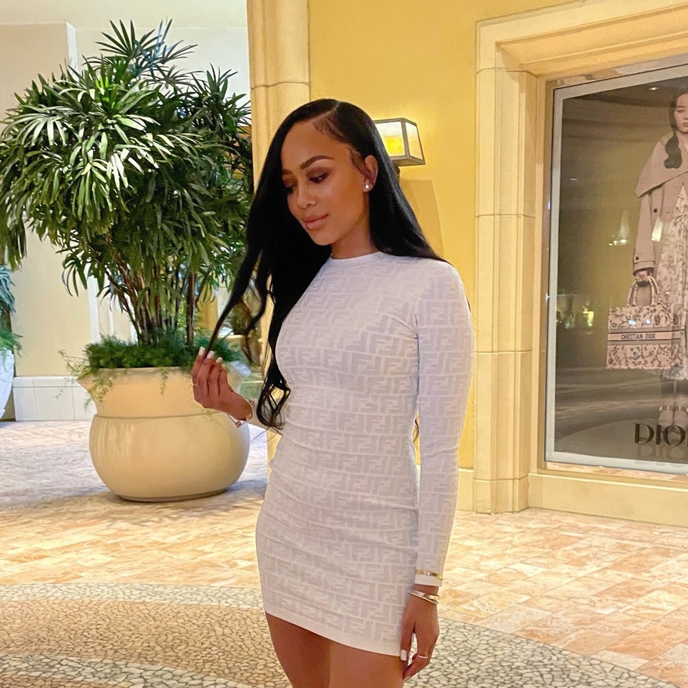 Fendi long-sleeved crew-neck short dress. Made of white viscose knit. Worn once.
